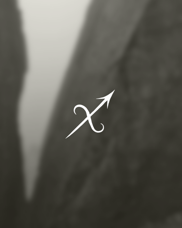 sagittarius symbol on abstract background shemana 