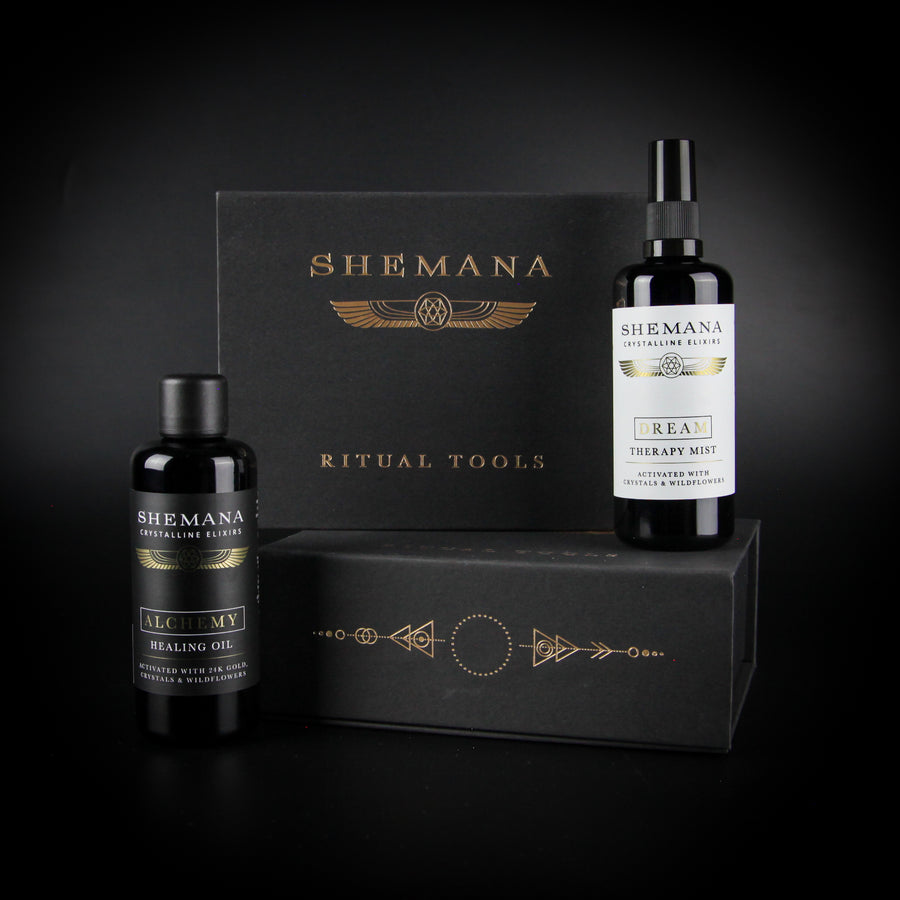 body oil and body mist with essential oils in a black and gold box Shemana logo miron bottles